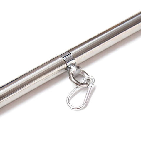 Metallic rod with a clasp on a white background