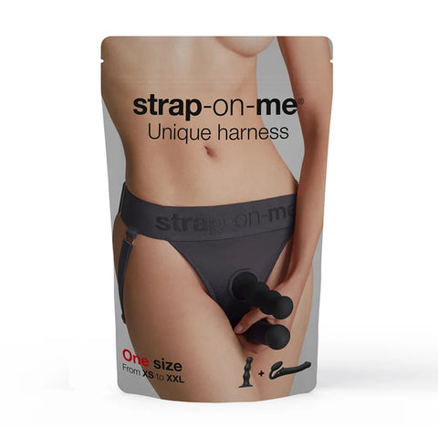 Product packaging for 'strap-on-me' unique harness with a model wearing it.