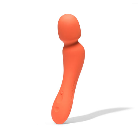 Orange silicone wand on a white background