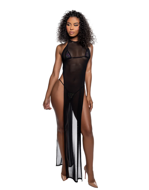 Model wearing a black mesh dress with a high slit on a white background