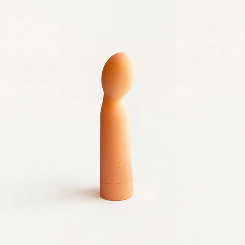 Orange vibrator on a white background