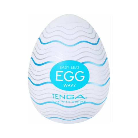 Tenga Easy Beat Egg Wavy adult novelty product, featuring a white egg-shaped container with wavy blue lines and a central blue circular label.